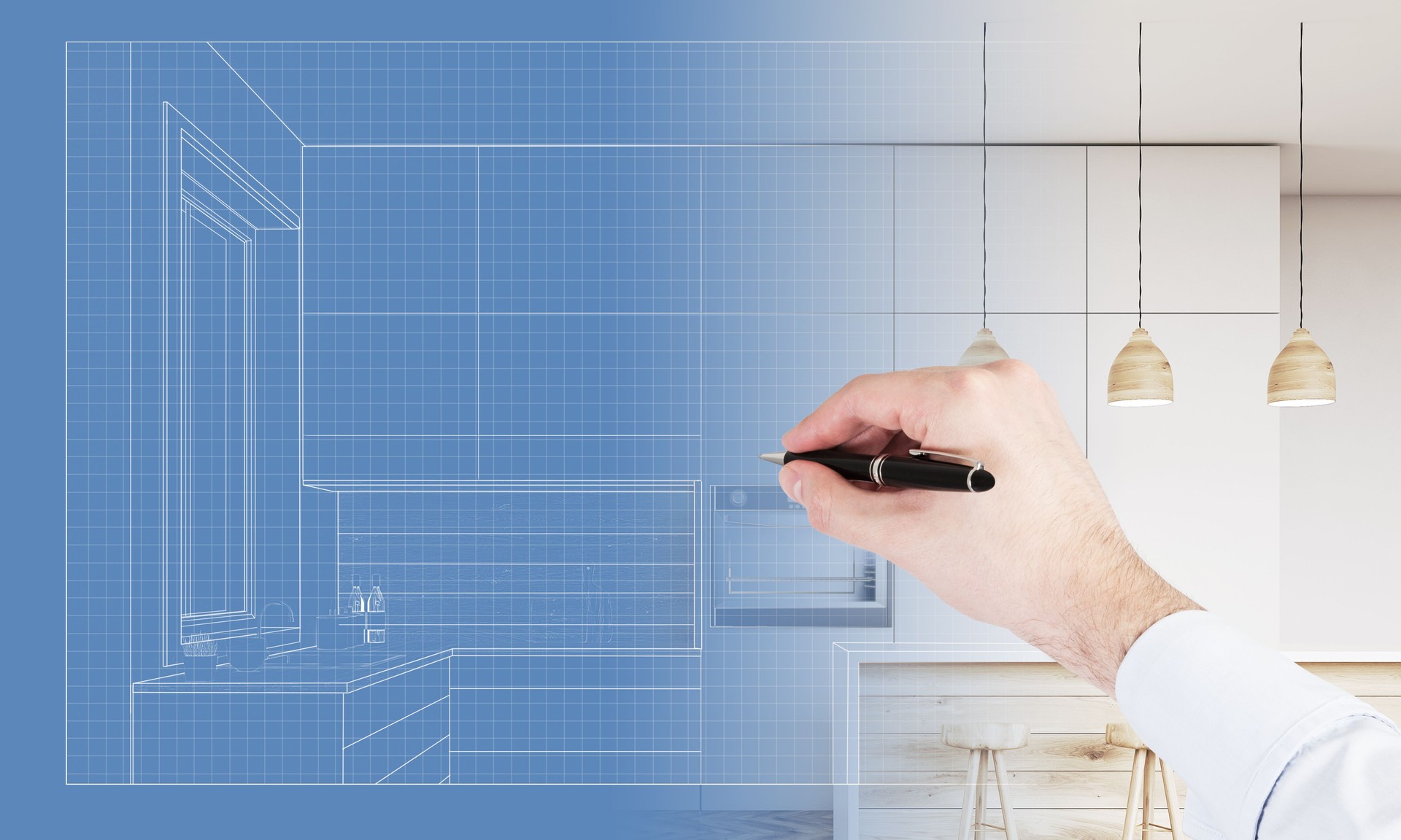 Homem desenhando um projeto de uma cozinha